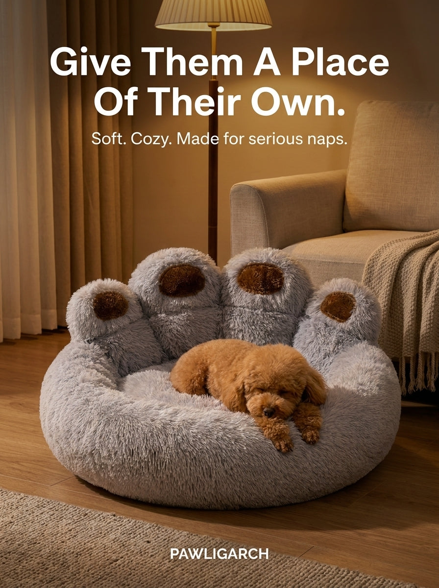 Small dog asleep in the PAWLIGARCH PawPrint Cuddler Dog Bed in a warm evening living room