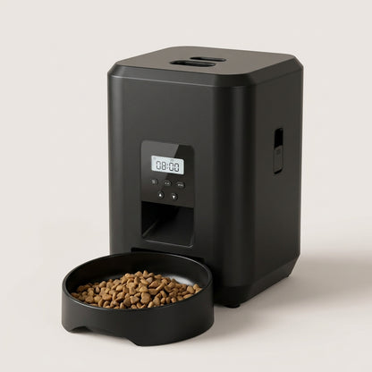 SmartServe Timed Automatic Cat Feeder in black, front three-quarter view with dry food in the bowl