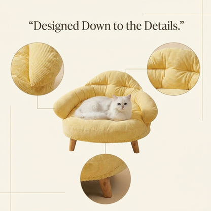 Close-up detail of the Corduroy Lounge Cat Bed's fabric texture and wooden legs
