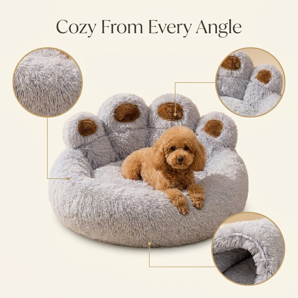 Close-up detail of the PawPrint Cuddler Dog Bed's plush texture and paw-shaped bolsters